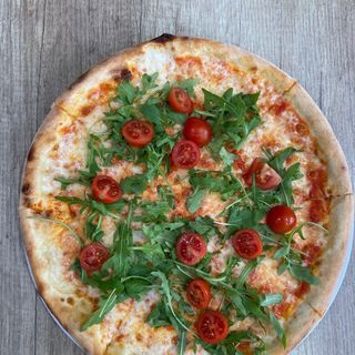 Pizza pomodorini e rucula