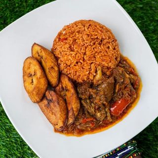 Smokey jollof served with 3 beef , plantain 