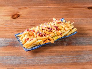 Patatas con bacon y cheddar