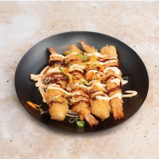 Langostinos Tempura Con Salsa De Curry Y Mango