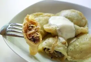 Pierogi kapusta pieczarki 9 szt