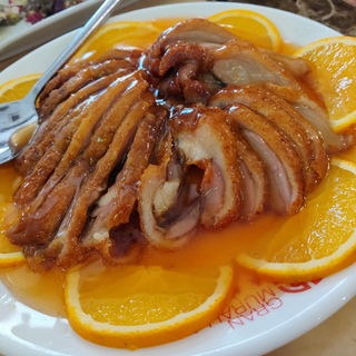 Pato con salsa de naranja 
