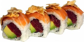 88. Uramaki Tonyina I Salmó Amb Alvocat I Maionesa Picant Amb Ametlla I Salsa Anguila (8 Uds.)