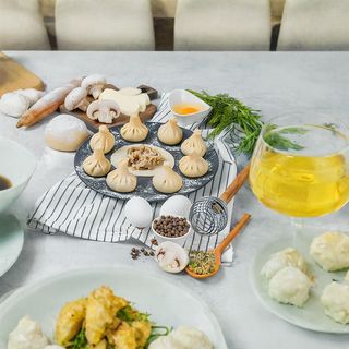 Хинкали с шампиньонами и сыром сулугуни 