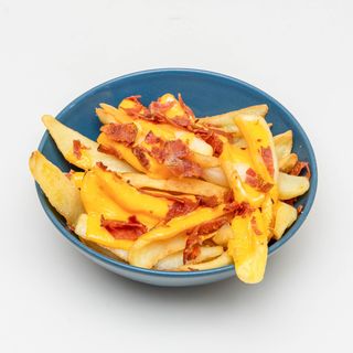 Patatine dippers con salsa al cheddar e bacon