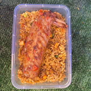 Fire wood jollof rice served with turkey 