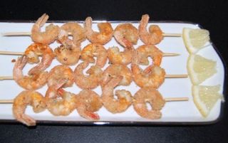 Spiedini di gamberi in salsa satay