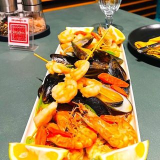 Seafood with vegetables, cognac and spicy sauce