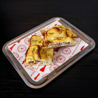 Trancio porchetta in crosta di patate