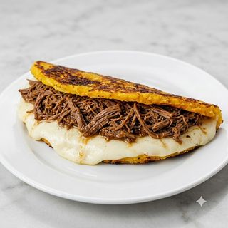 Cachapa Con Carne De Ternera Desmechada Y Queso De Mano (1 Ud.)