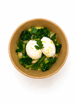 Green shakshuka with poached king prawns and vegetables