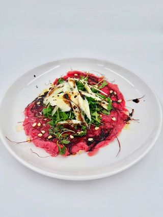 Carpaccio di Black Angus con parmigiano