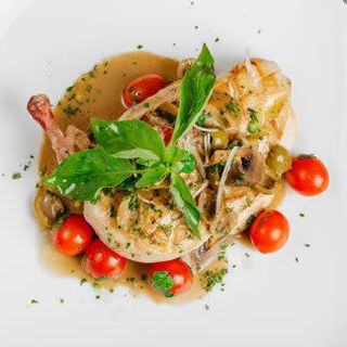 Филе курицы в грибном соусе и томатами