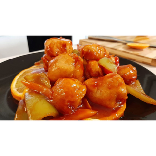 50. Панирано пилешко в сладко-кисел сос