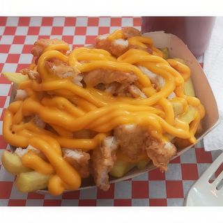 Nacho con Queso y cebolla morada