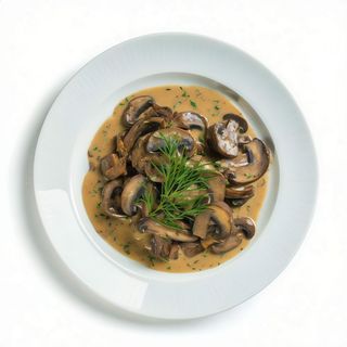 Ternera Con Crema De Champiñones