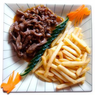 Ternera Con Patatas Fritas