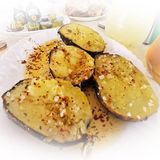 Patata asada aliñada con salsa criolla