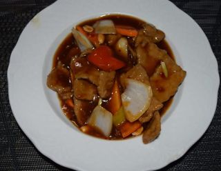 60. Maiale in Salsa Piccante