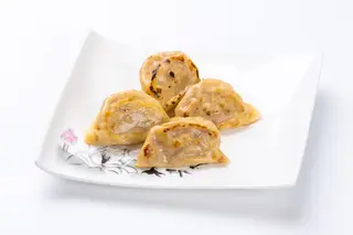 16 Ravioli di carne alla piastra - 4 pezzi