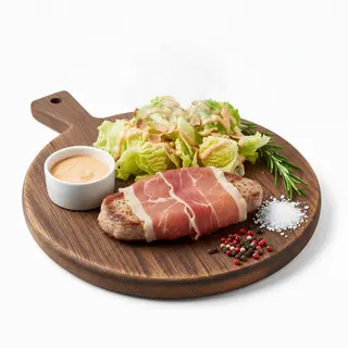 Braciole di maiale con prosciutto crudo