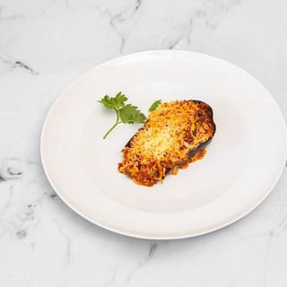 Berenjena rellena de carne y pisto