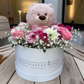 Flowers with spring teddy