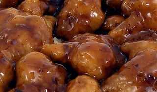 2160 Панирани свински хапки в сладко-кисел сос (700г)