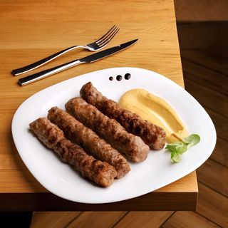 Mititei la grătar-muştar (bucata)