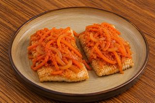 Hake in carrot marinade