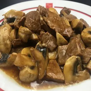 Ternera Con Champiñones