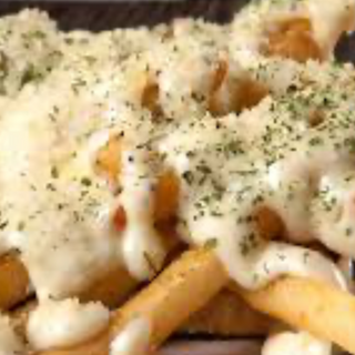 Patatas trufadas con padano 