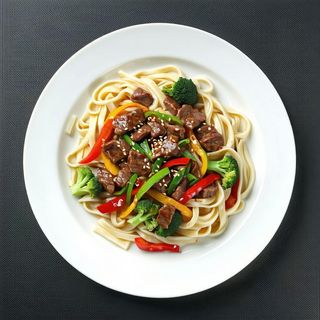 Udon saltati con manzo e verdure