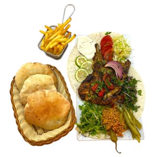 1/2 Poulet cuit sur feu de charbon