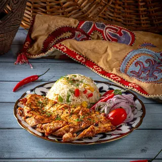 Куриное филе на огне с рисом