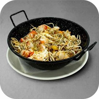 Sartén De Patatas Con Gulas Y Huevo