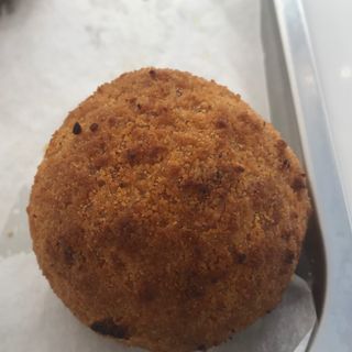 Arancino al burro e prosciutto fritto 