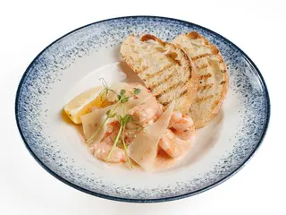 Креветки в вершковому соусі (270g)