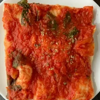 Mezza teglia di focaccia rossa