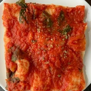 Mezza teglia di focaccia rossa