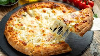 Pizza 4 Quesos Fiesta (33 Cm.)