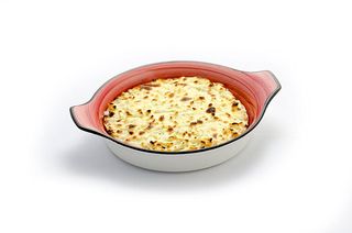 გაფიცხებული ღომი ჩამდნარი ყველით