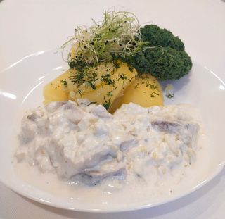 Śledzik w śmietanie