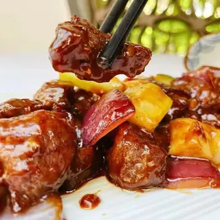 SSolomillo de ternera salteada con pimenta negra