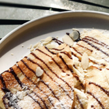 Crepes with chocolate and seasonal fruits