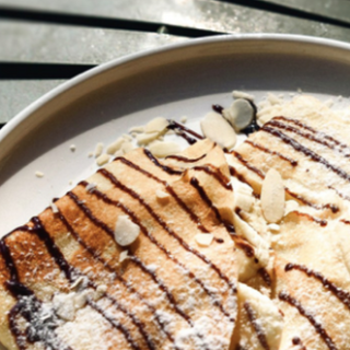 Crepes with chocolate and seasonal fruits