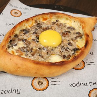 Khachapuri "Julienne" with blue cheese, mozzarella and mushrooms