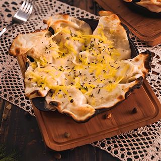 Zapiekane pierogi z kiszoną kapustą