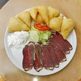 Uštipci sa kajmakom i pršutom