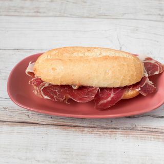 Paleta Ibérica con aceite y tomate mini